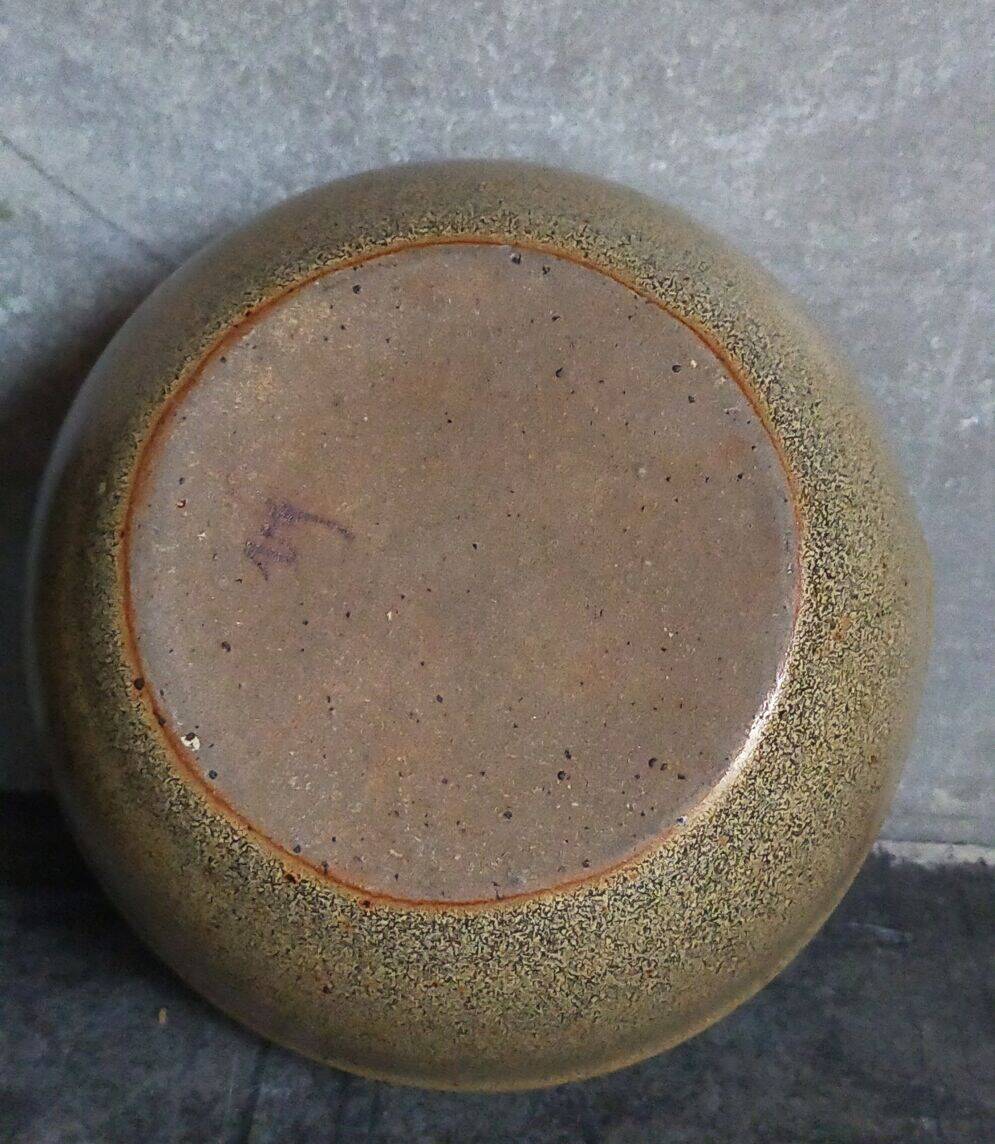 Three nesting pottery salad bowls in glazed stoneware