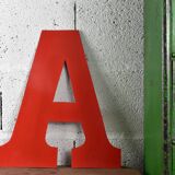Industrial letter "A" in red metal