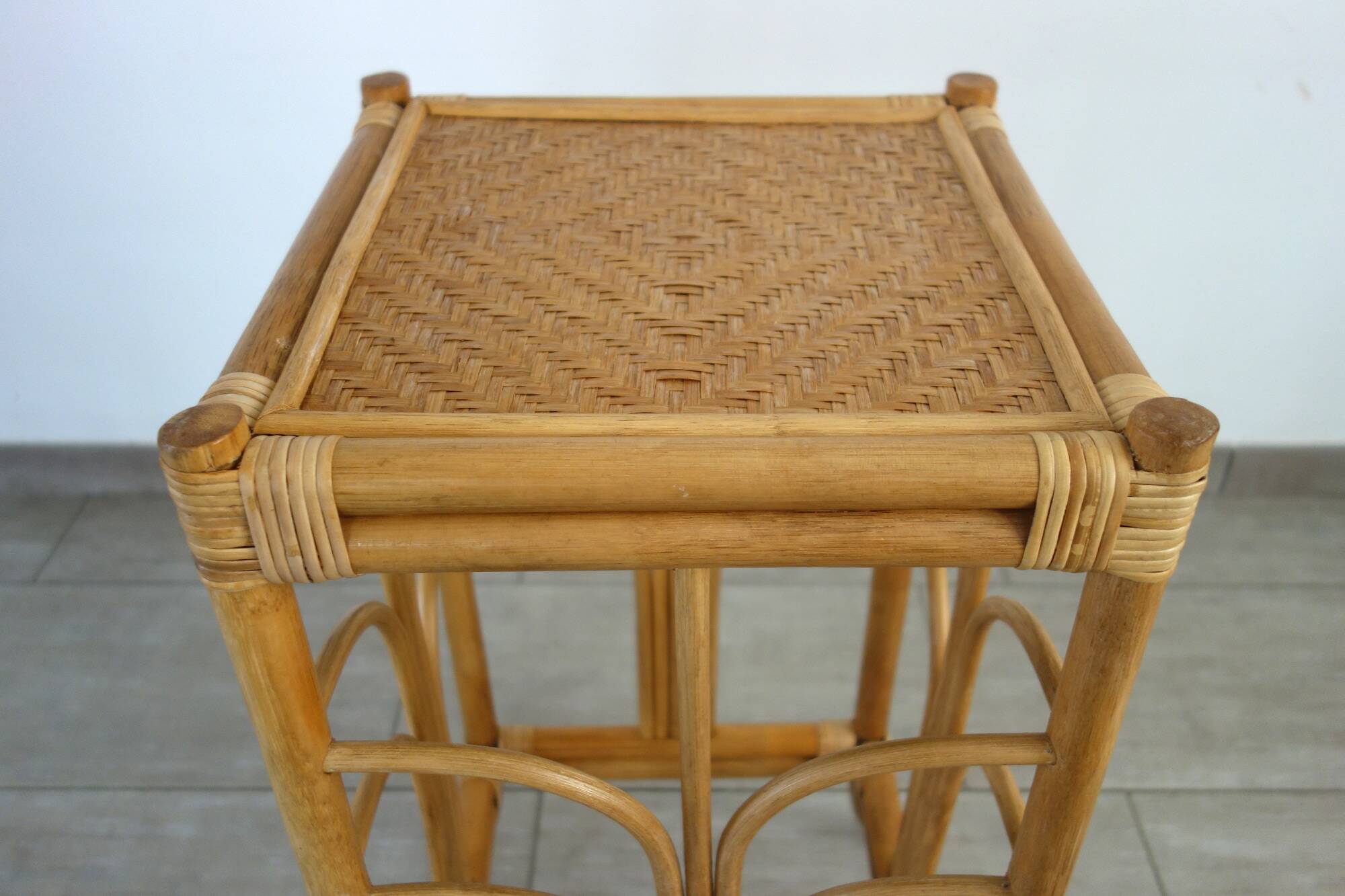 Vintage bamboo and woven rattan side table.
