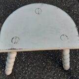 Duo of milking stools with turned legs.