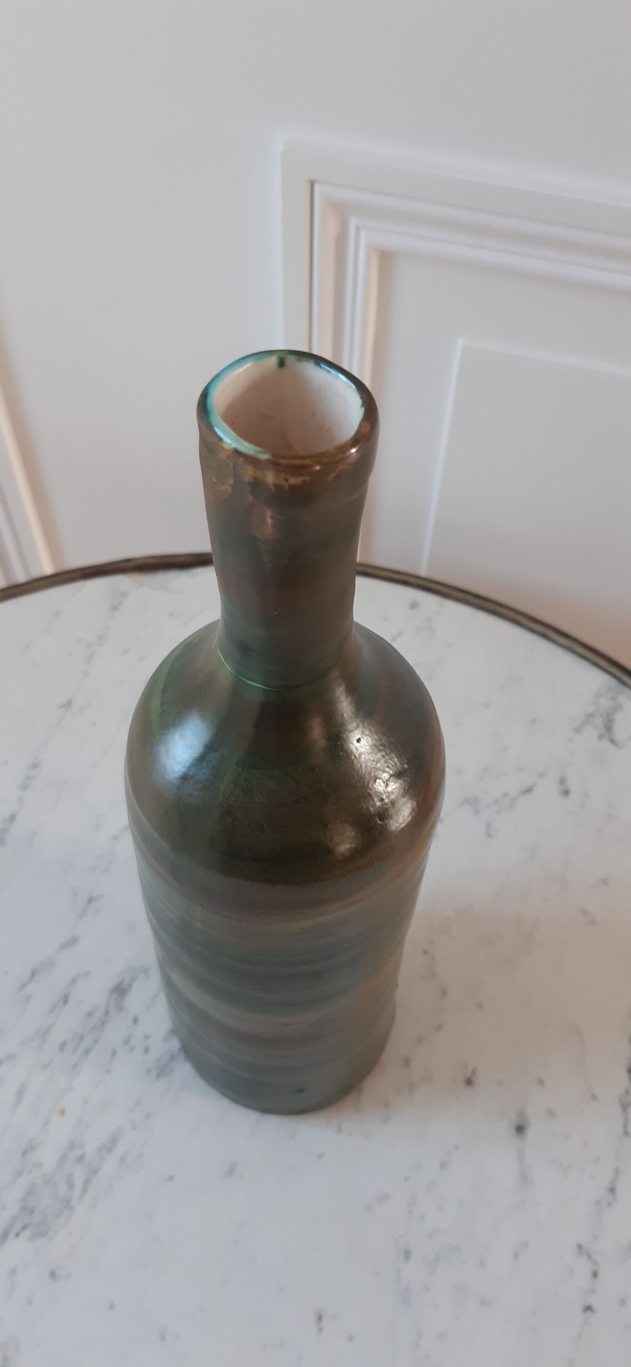 Bottle in sandstone 70s