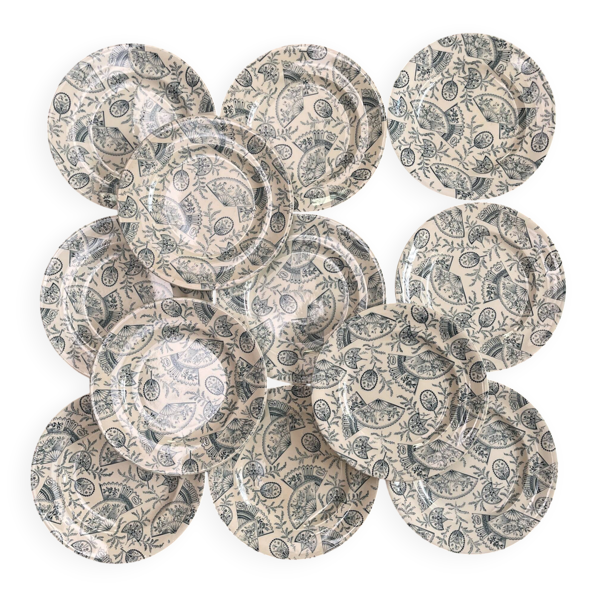 12 assiettes Terre de fer Longwy