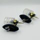 Pair of vintage wall lights with textured glass, attributed to Maison Arlus.