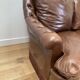 Chesterfield leather sofa with fringes