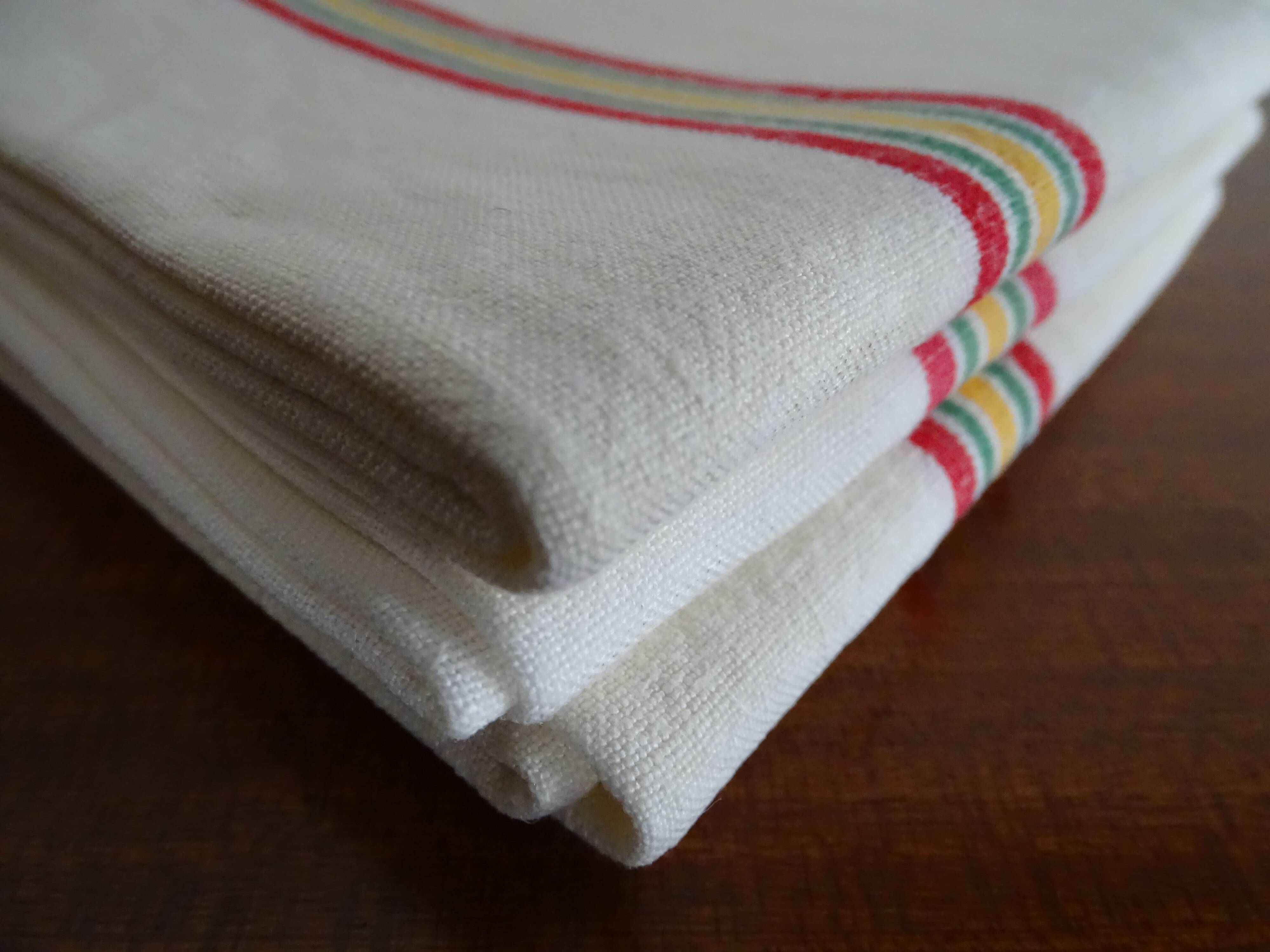 3 old linen cotton tea towels with vintage bedding