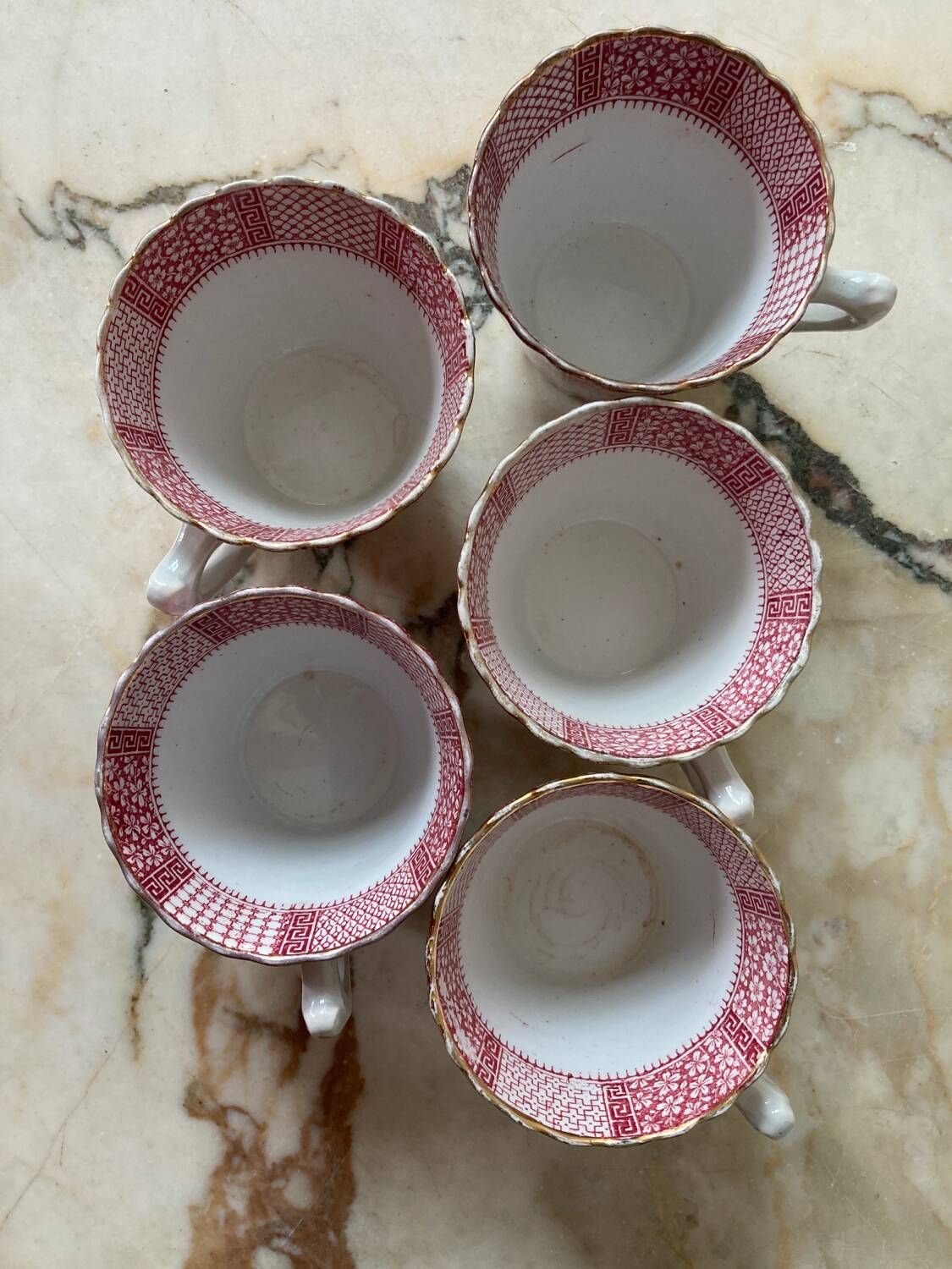 Set of 5 Lunéville “K and G” cups and saucers