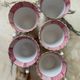 Set of 5 Lunéville “K and G” cups and saucers