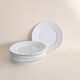 White ceramic twisted dinnerware set