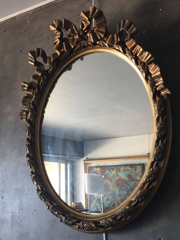 Miroir  doré ovale