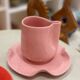 Set of ceramic artisan mugs with pink pop Barbapapa water lily design.