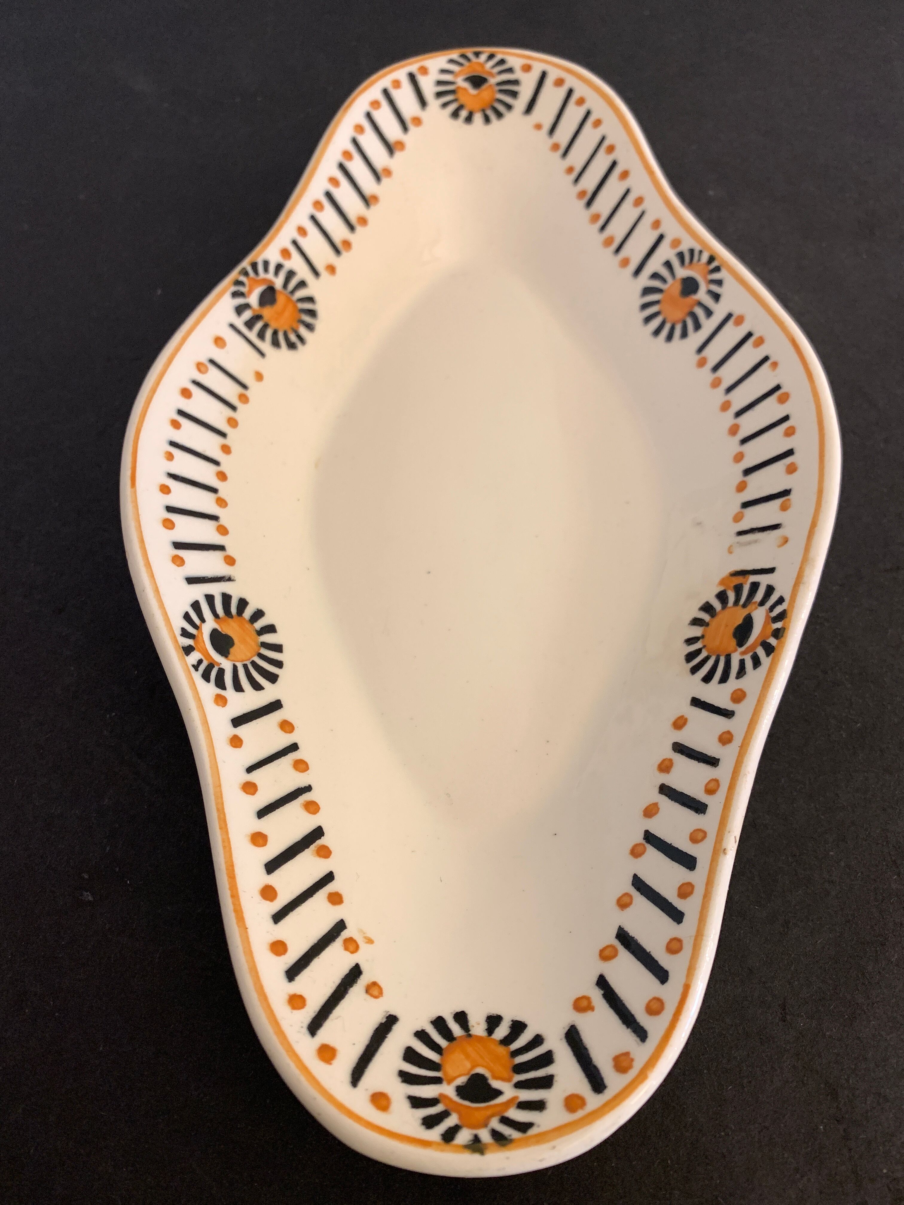 Pair of art deco raviers signed Longwy and numbered, model Gerazine