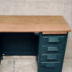 Antique desk with drawers and shelf