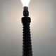 Pied de lampe en bois tourné et en forme d'ogive