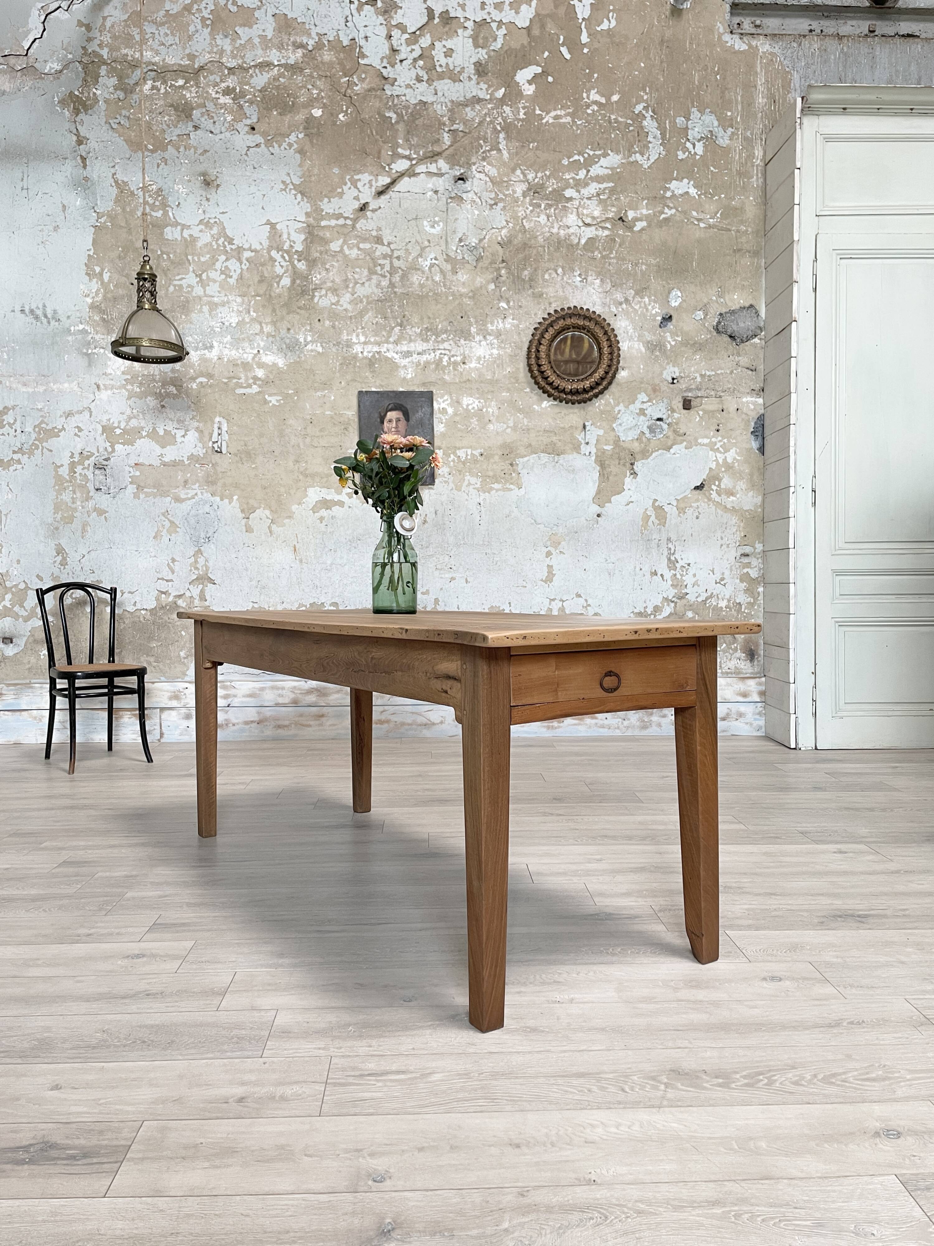 Vintage farmhouse table with spindle legs.