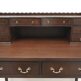 A desk with an English-style chair. After professional renovation.