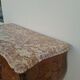 Commode style Louis XV en marqueterie et bois de rose