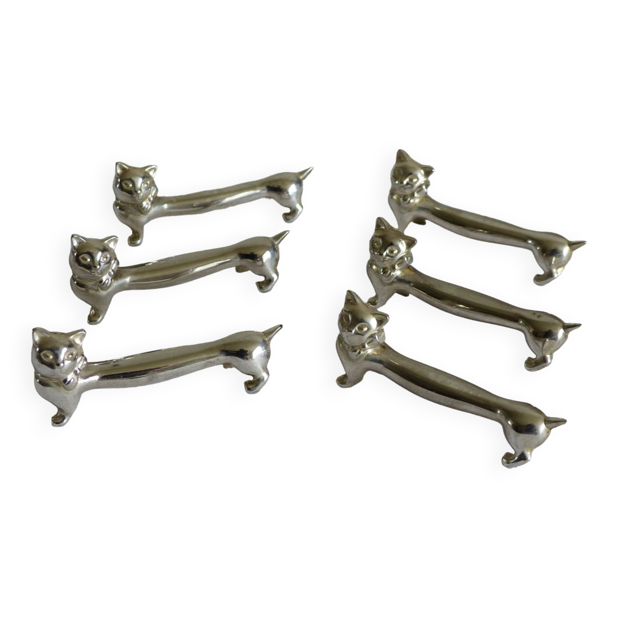 6 metal knife holders, cat theme.