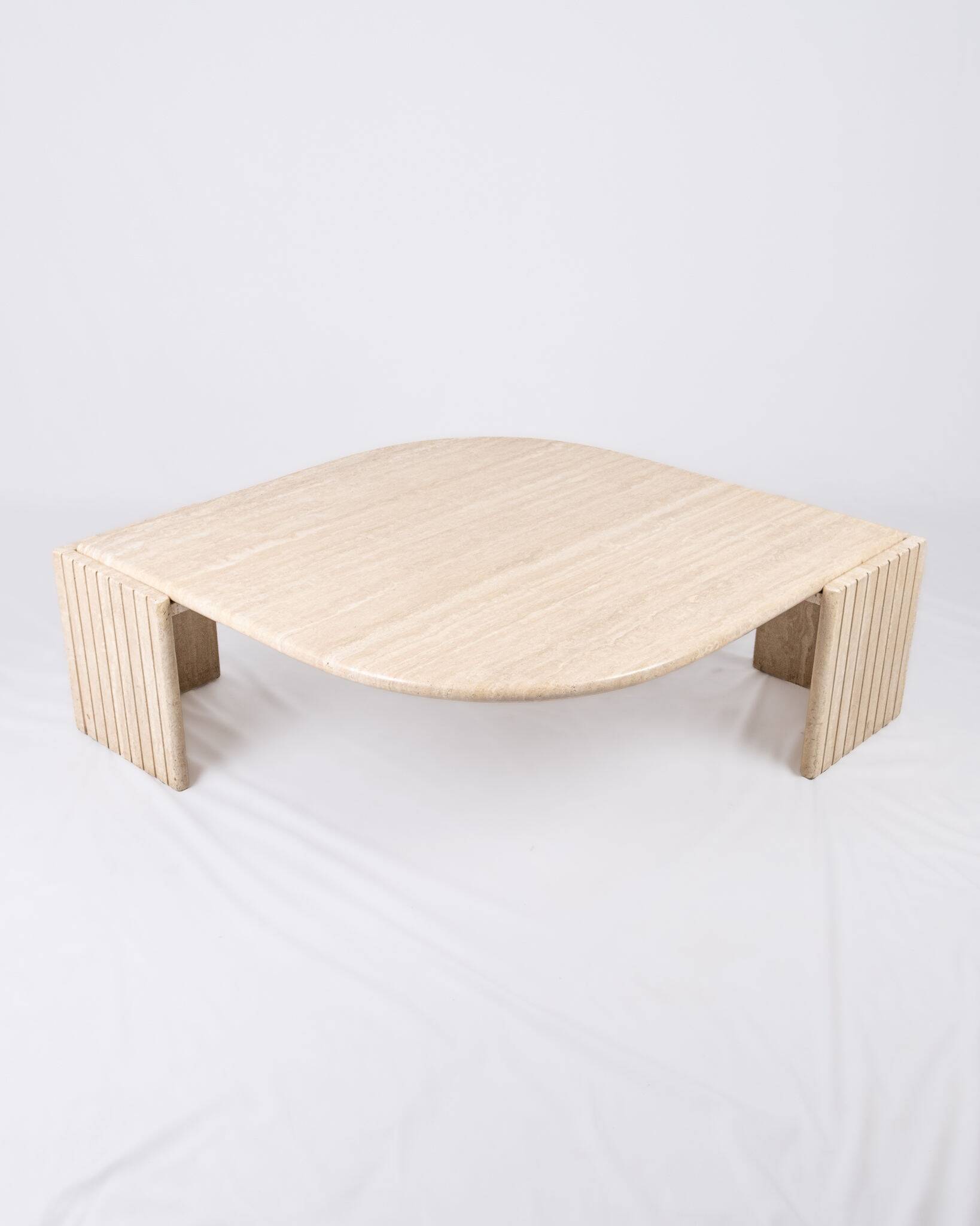 Travertine eye table, Roche Bobois, 1970-80