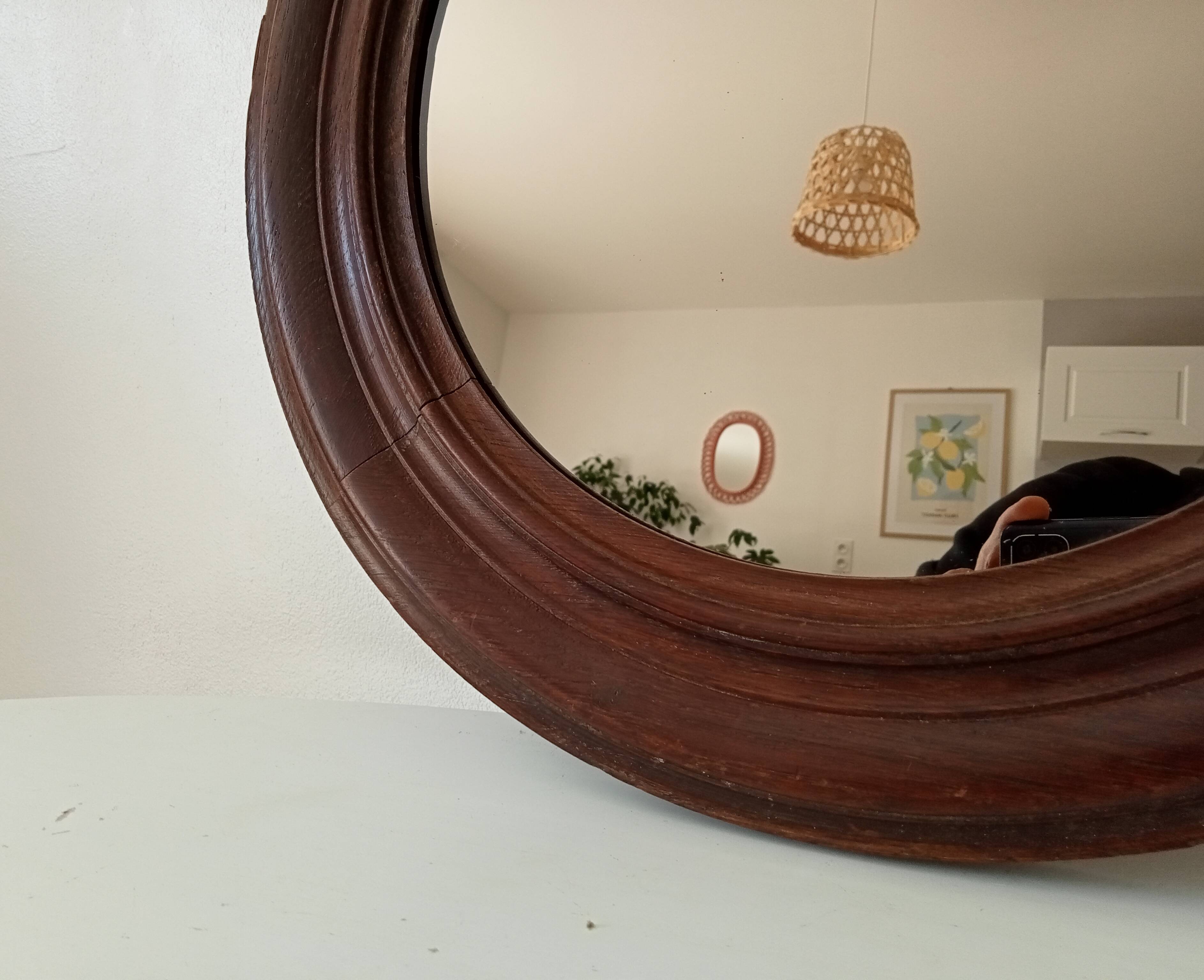 Antique round wooden mirror