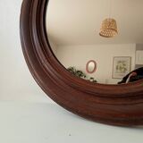 Antique round wooden mirror