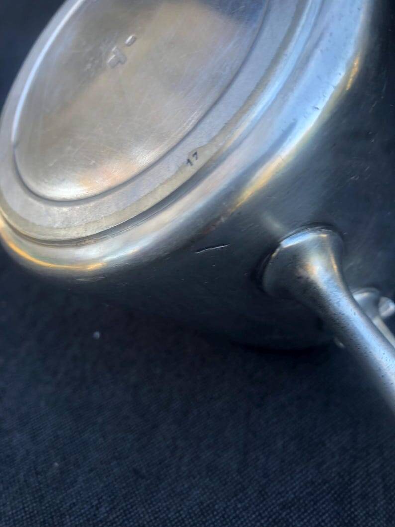 A pair of vintage silver-plated teapot and coffee pot