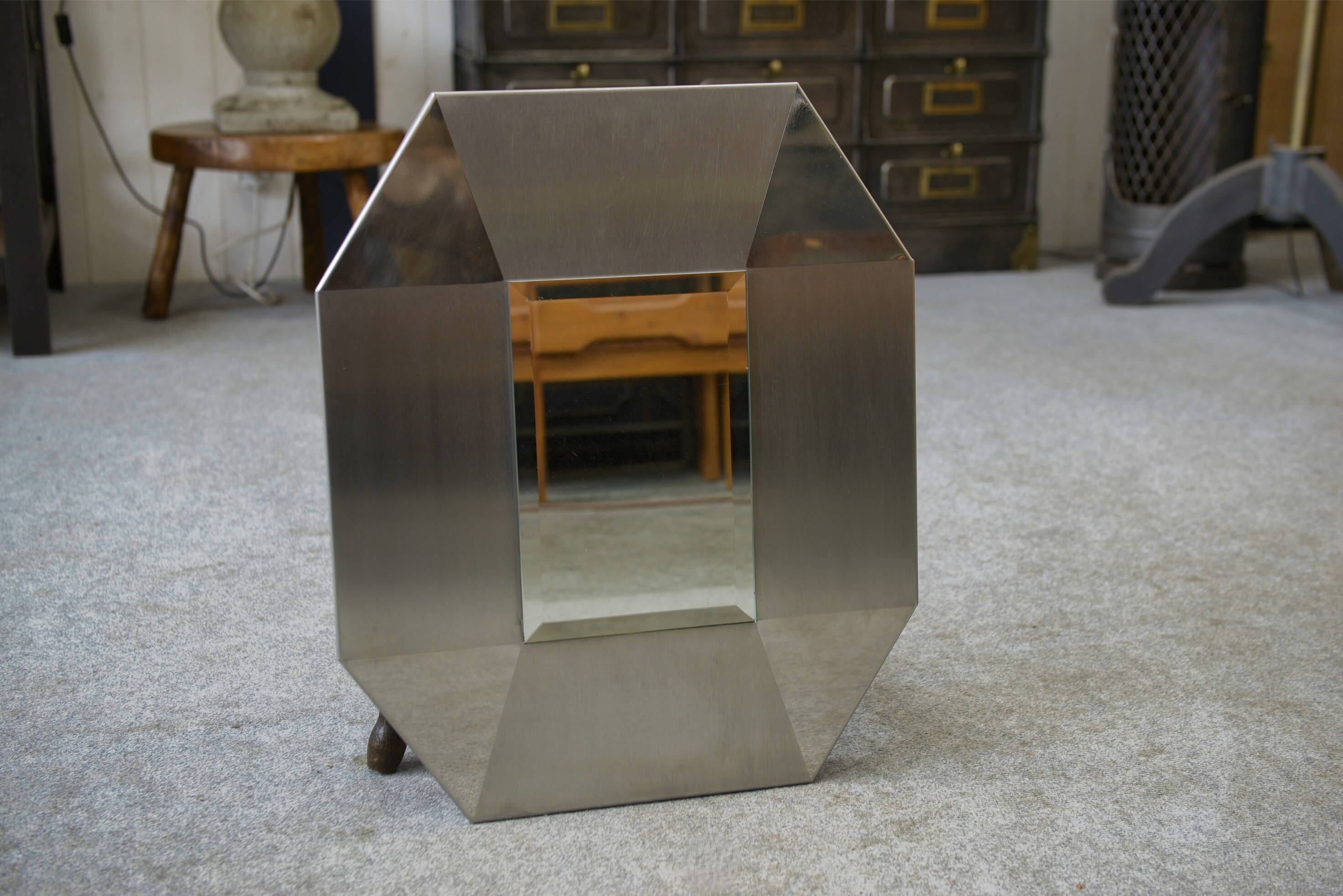 Designer mirror in brushed and chrome-plated stainless steel, beveled glass, 1970s