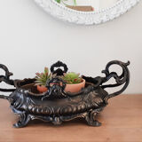 Restyled regulated planter