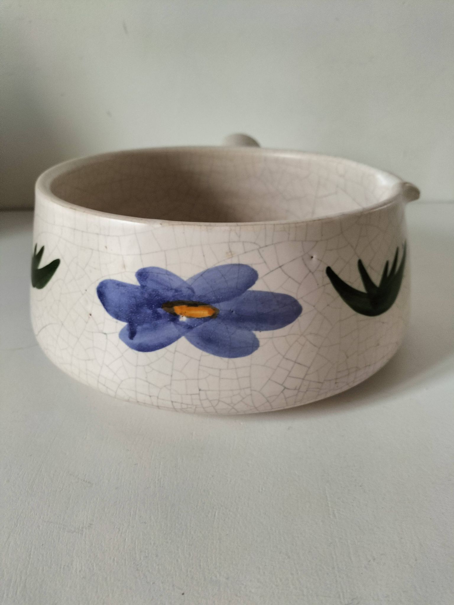 Large antique crackled ceramic fondue pot decorated with blue flowers