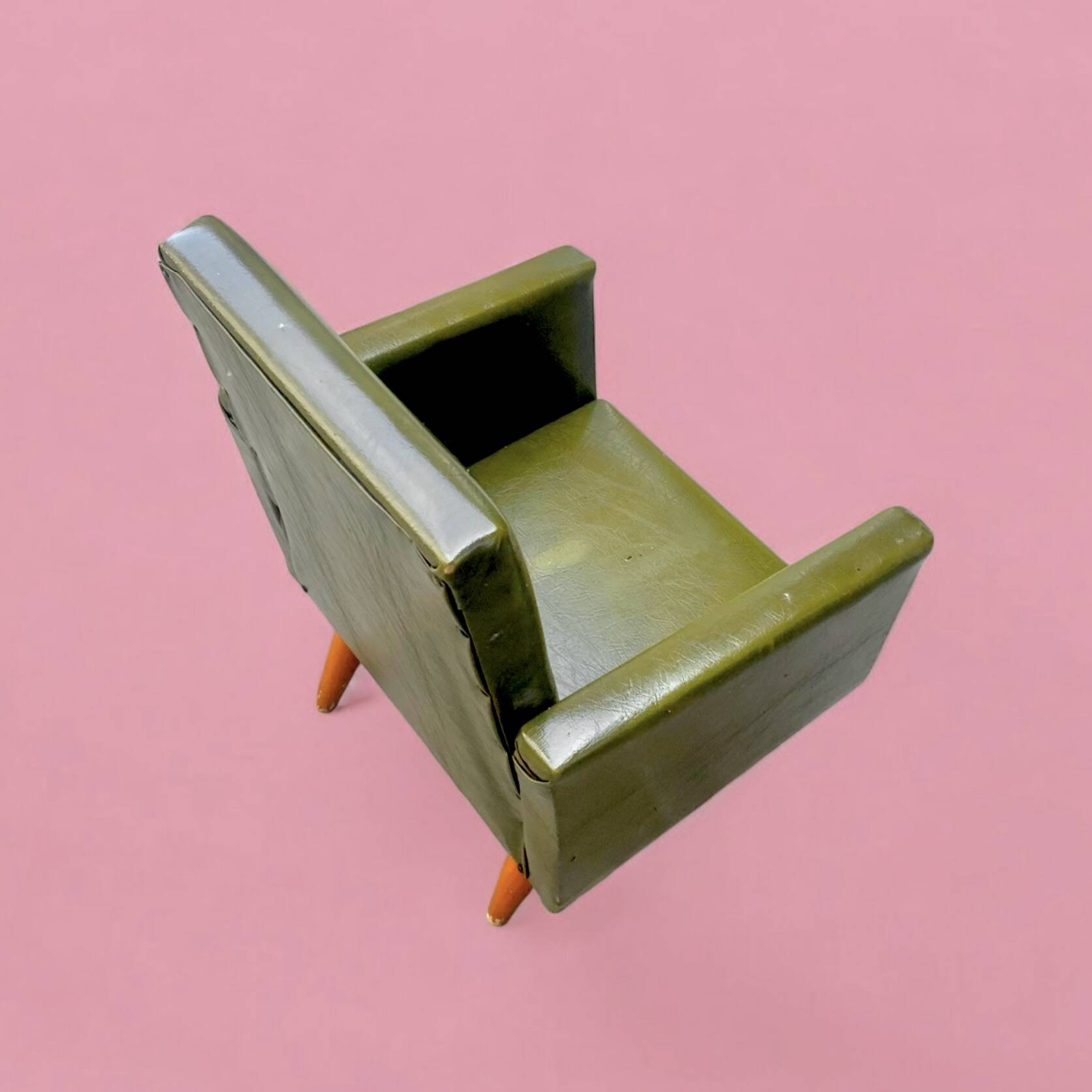 Vintage children's armchair in green skai