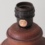 Vintage pottery table lamp with a new custom lampshade.