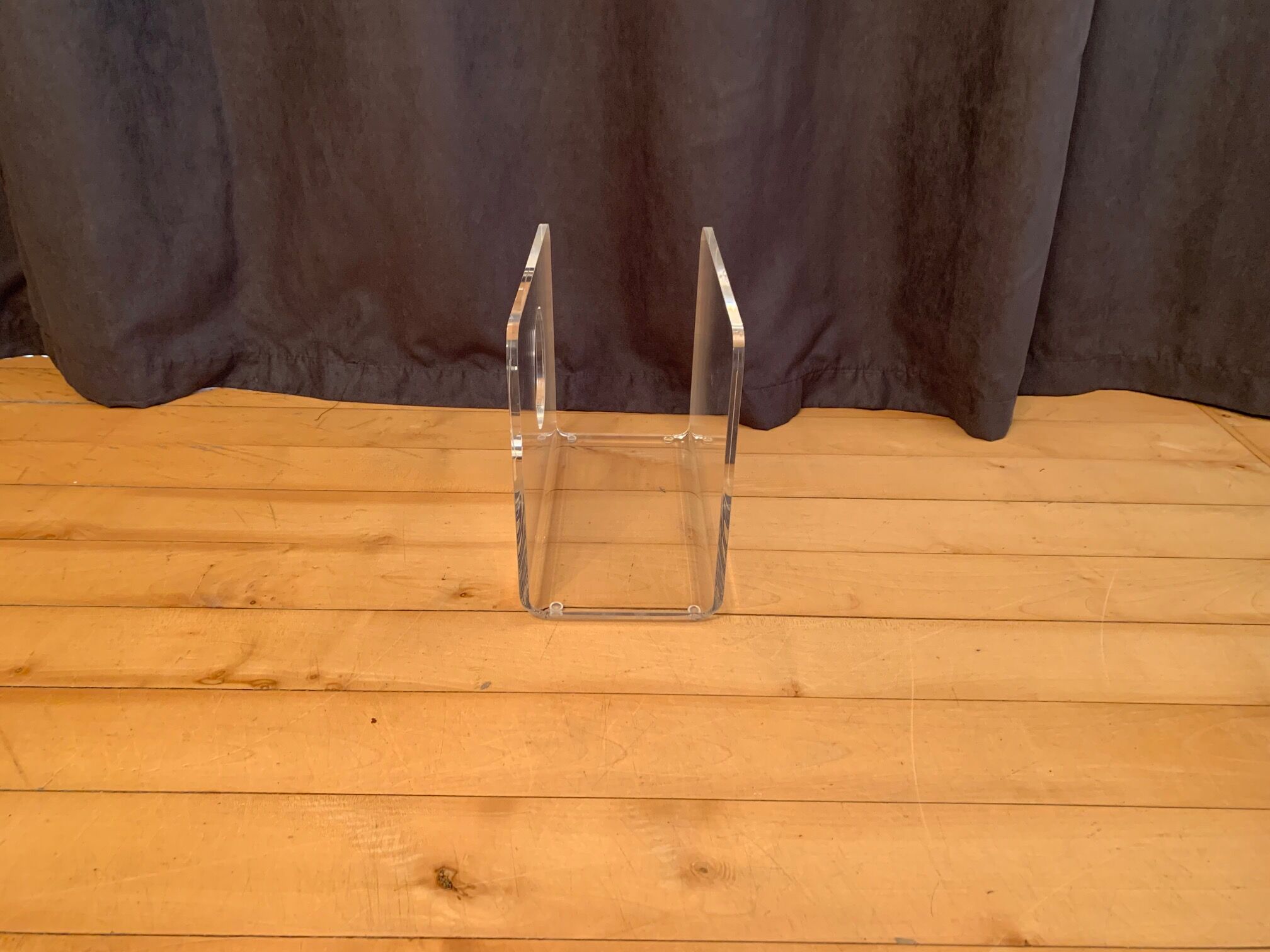 Lucite newspaper stand, 1970s