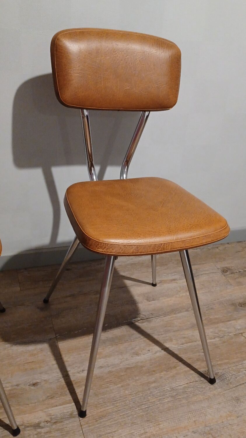 Pair of vintage faux leather and chrome chairs