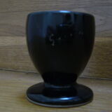 Black egg cup with hand-painted floral decoration