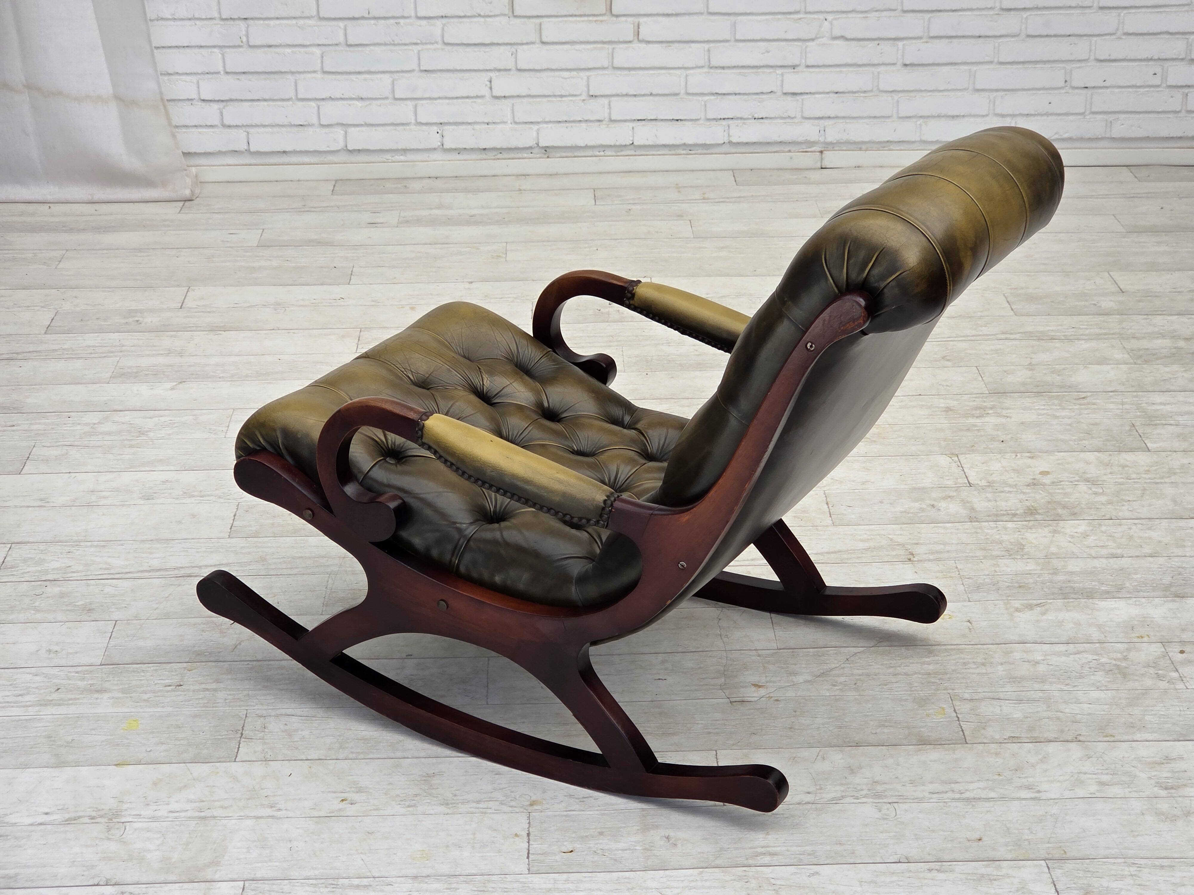 1950s, Chesterfield rocking chair, furniture leather, teak wood.