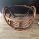 Grande table basse ronde vintage en rotin et verre fumé