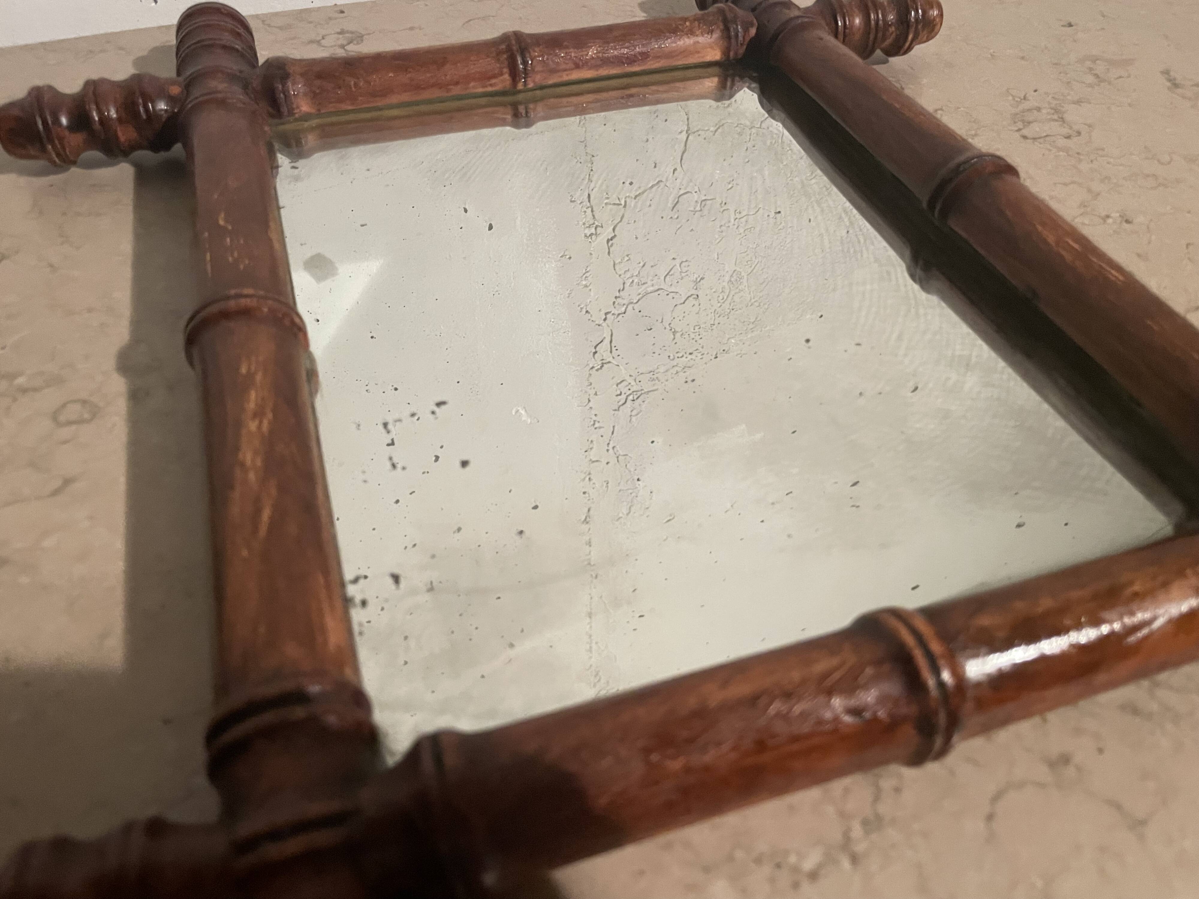 Pair of wooden mirrors from the 1940s.