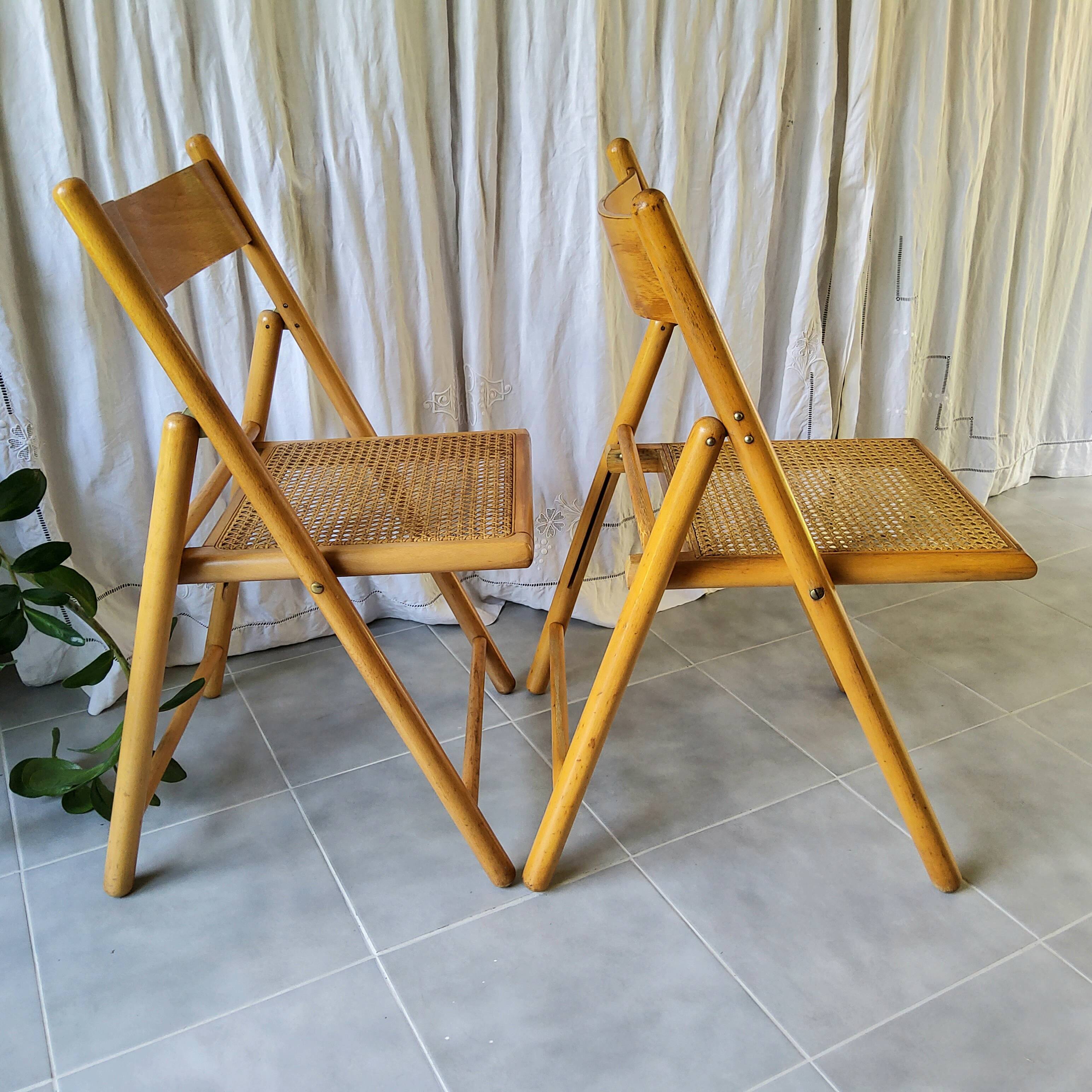 Pair of folding cane chairs