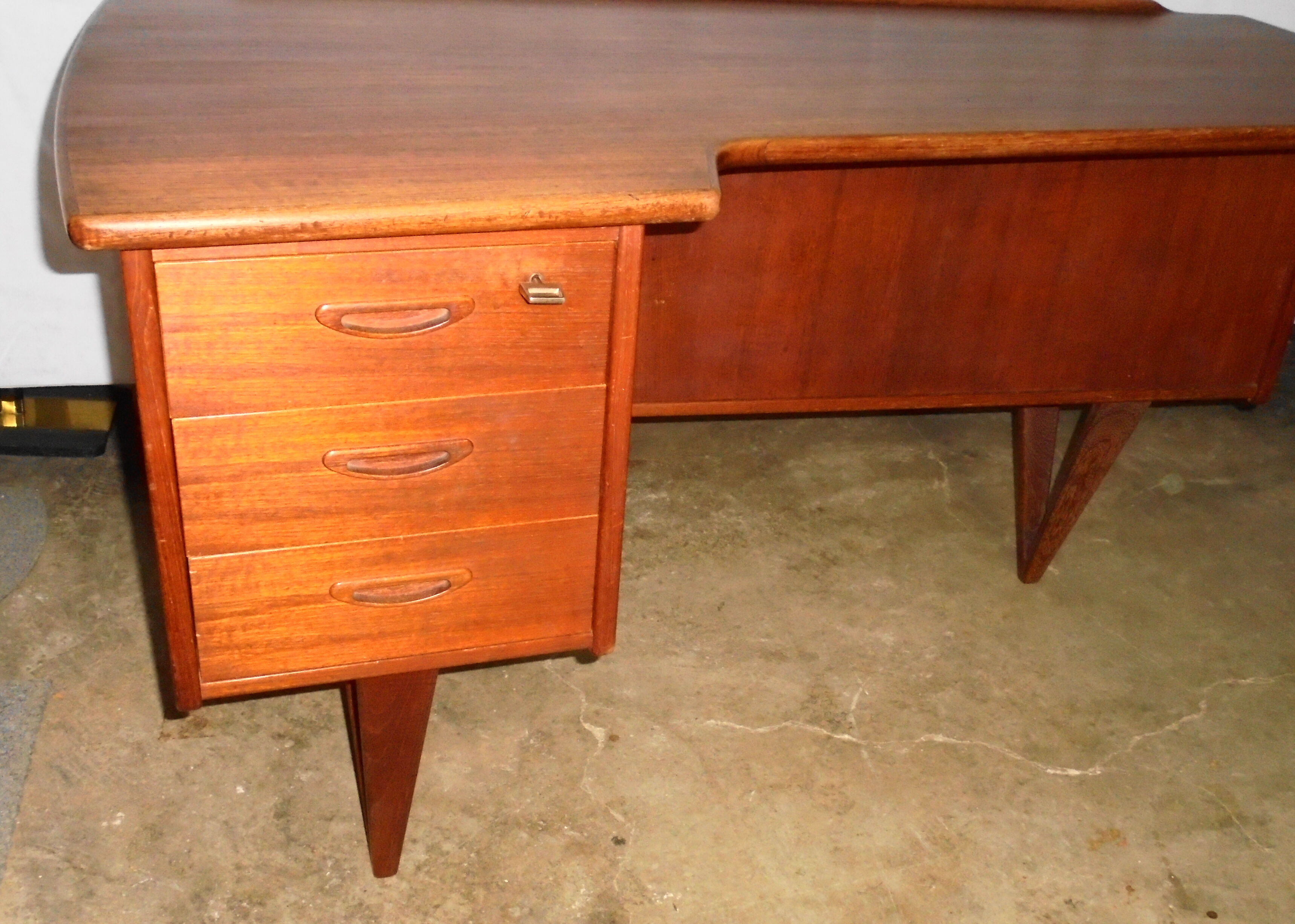 Peter Lovig Nielsen's Scandinavian teak boomerang desk from the 60s