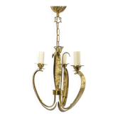 Three-armed chandelier in gilded brass, with leaf and scroll motifs, Art Deco style.