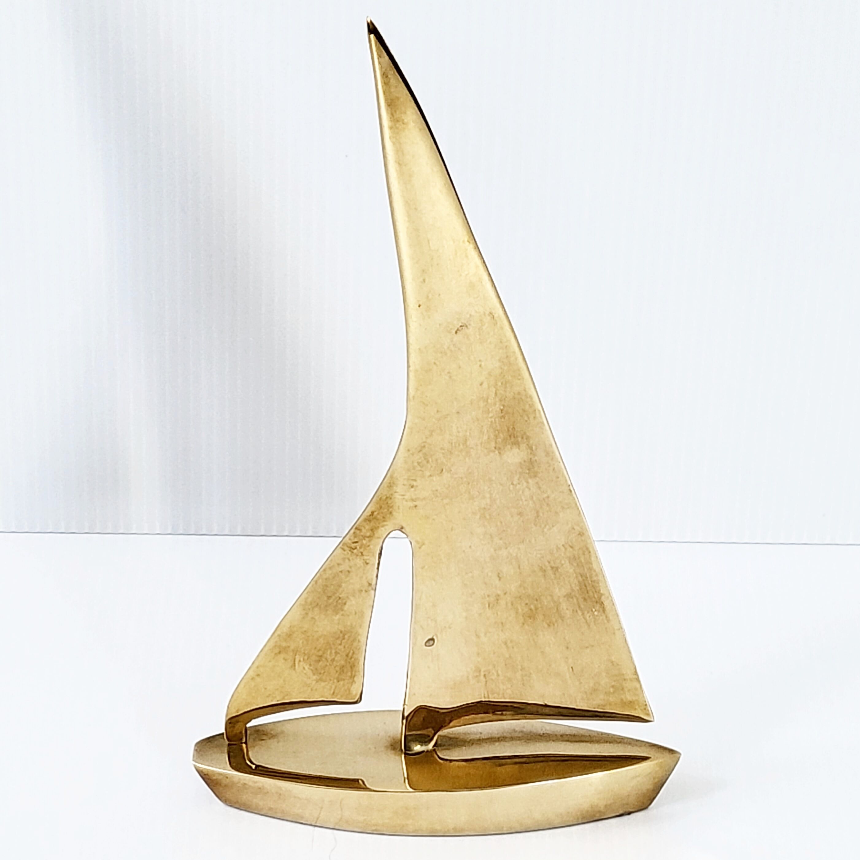 Vintage sailboat 1970 golden brass