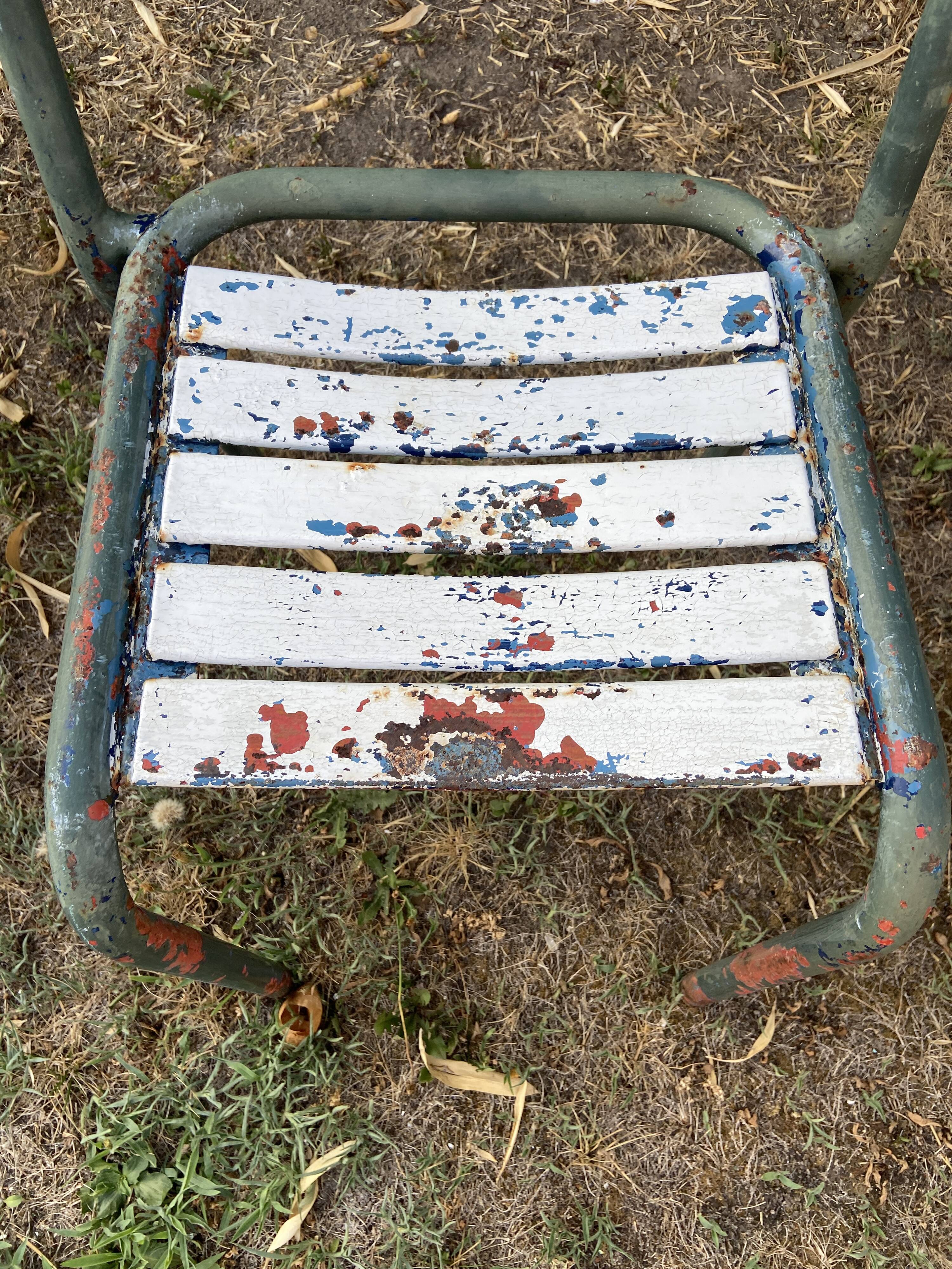 4 mismatched chairs Tolix brasserie bistro terrace French bistro 60s