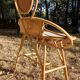 Vintage rattan hairdresser, 1960s, round mirror and woven backrest.