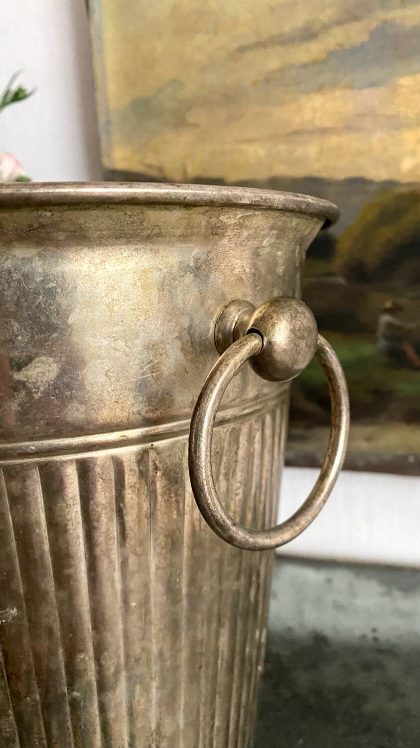 Patinated silver metal champagne bucket