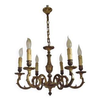 French Art Nouveau bronze chandelier with 6 lights, featuring scroll arms and leaf-shaped details.