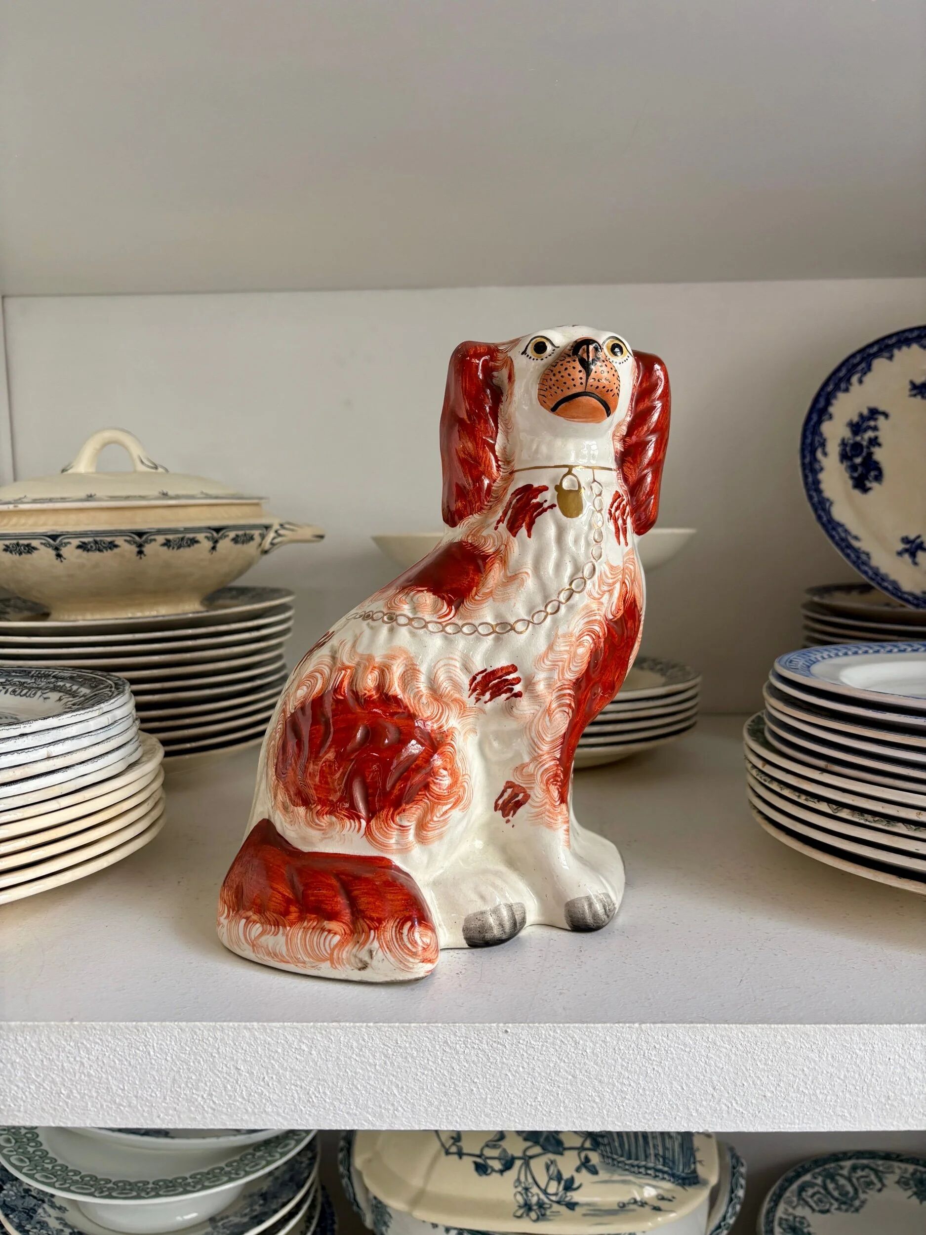 Staffordshire porcelain King Charles Cavalier dog in red, number 2, 19th century.