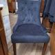 fauteuil capitonné velours noir design