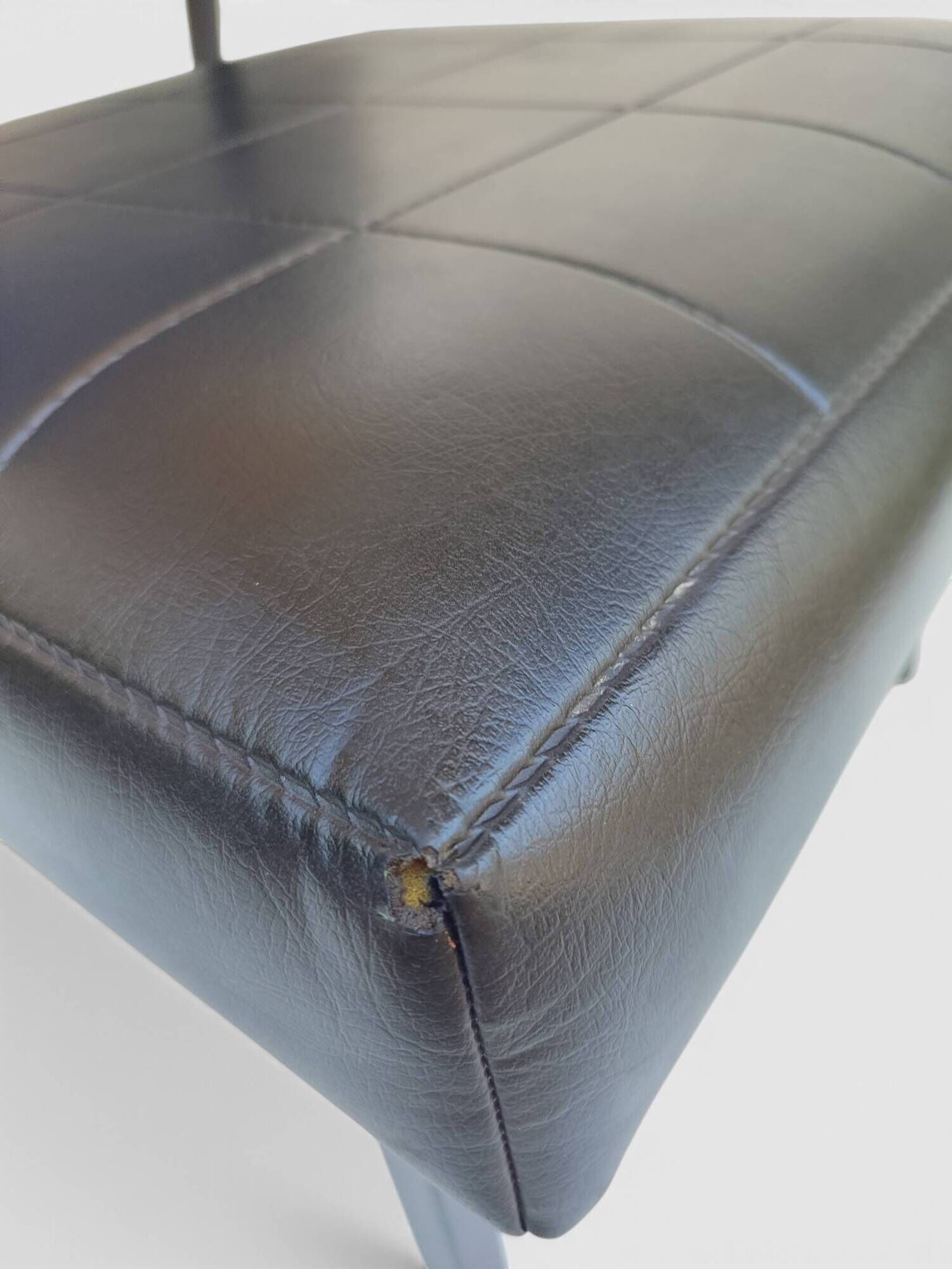 Modernist armchair in black faux leather and metal – 1960s