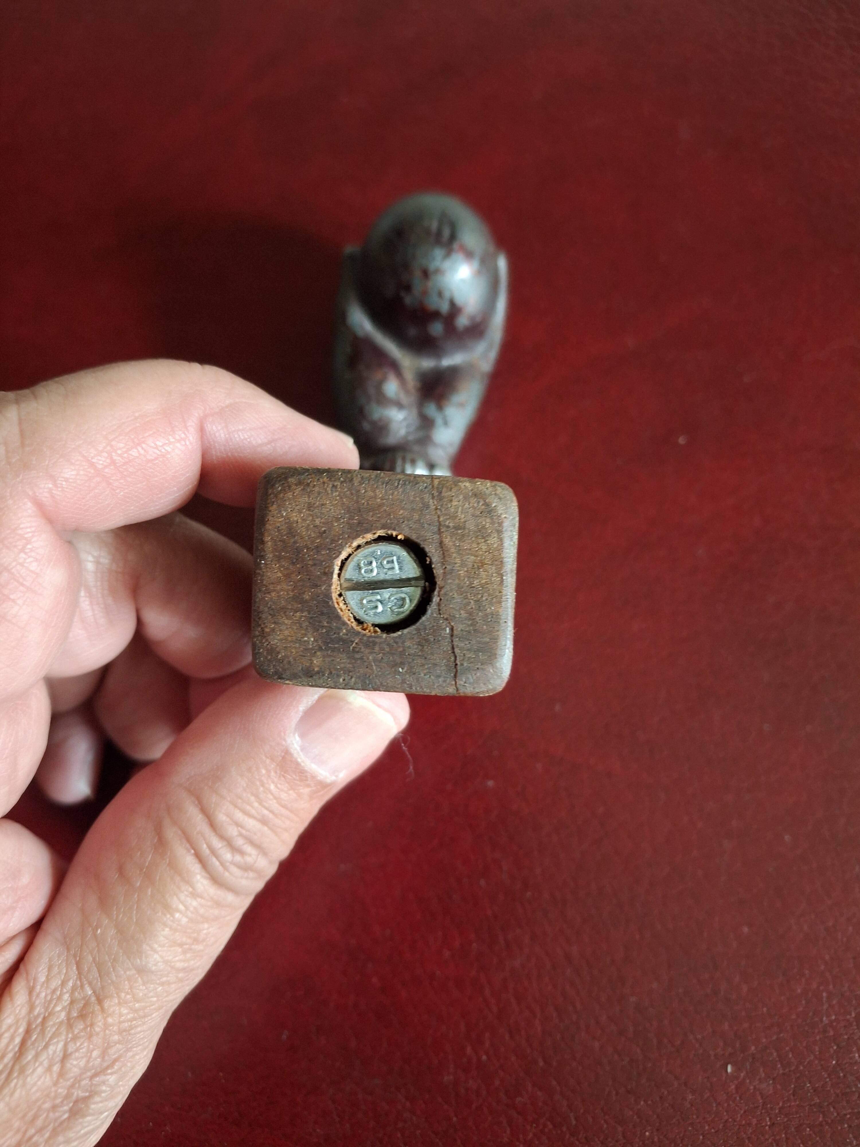 Cast iron door knocker from the 19th century or earlier.