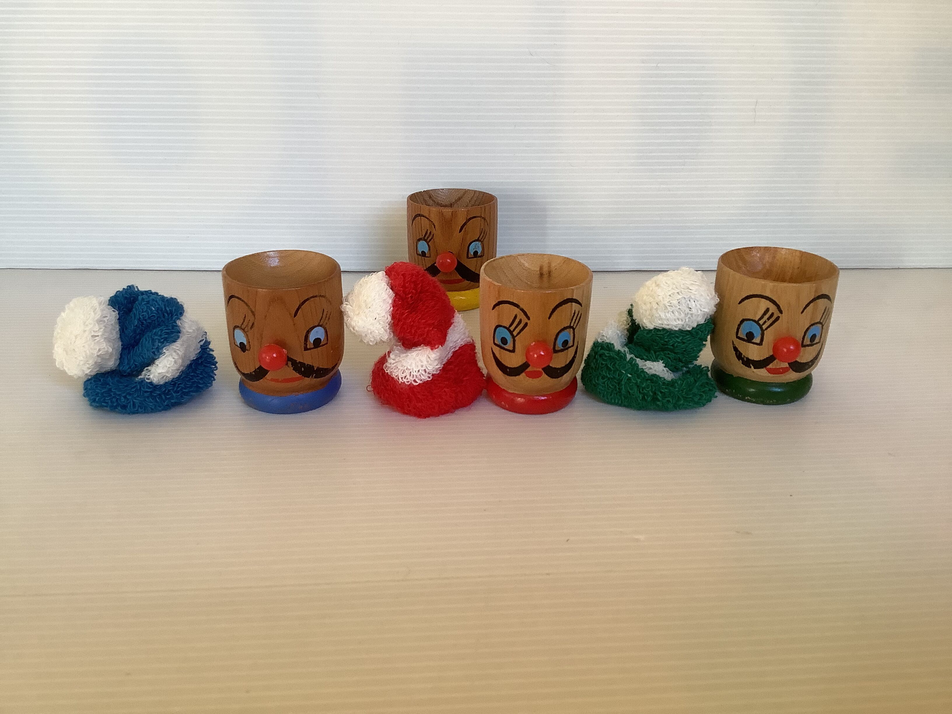 4 old wooden egg cups