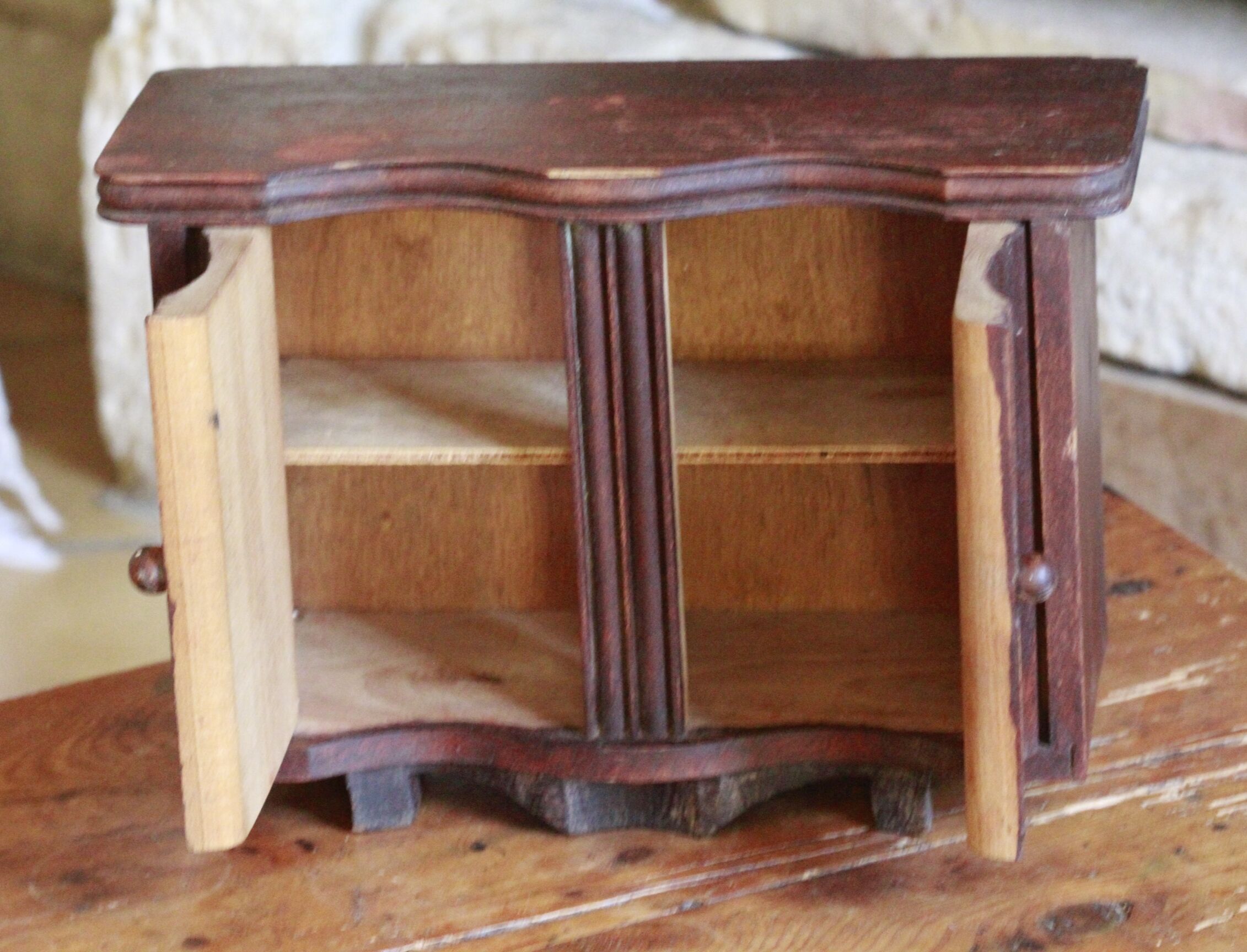 Old wooden doll sideboard